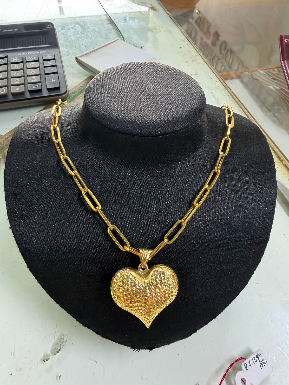 18 karat Necklace 10.03 grams 18 inches/18 karat Heart Pendant 5.16 grams