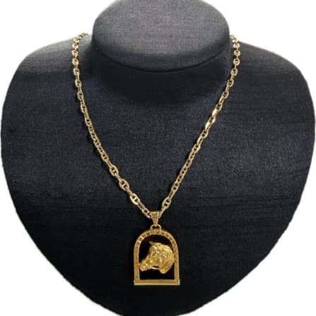 Necklace 14 karat 17 inches 6.8 grams/Pendant 18 karat 6.3 grams with titus