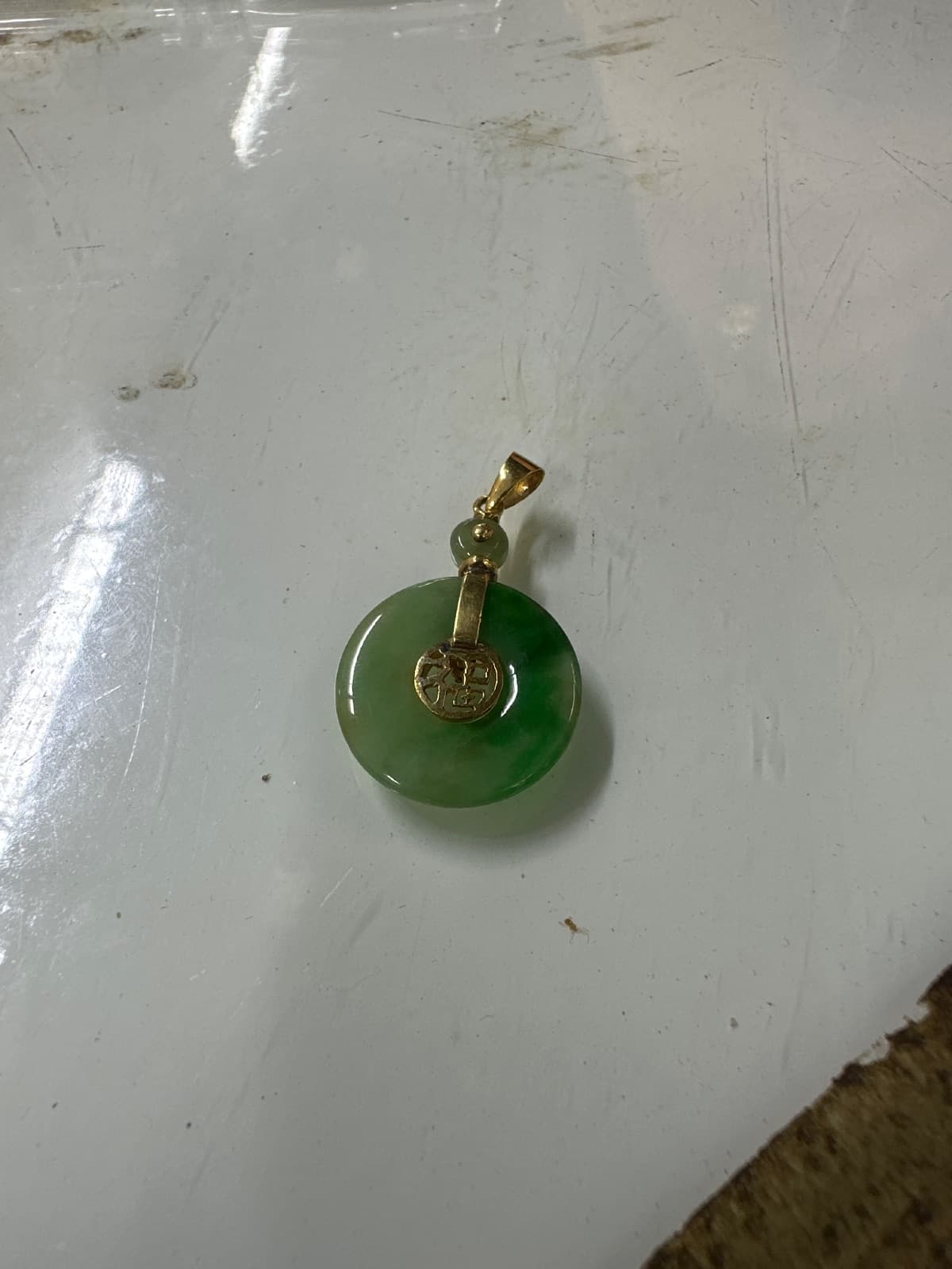 Natural Jade with Papers Set in 18k Yellow Gold